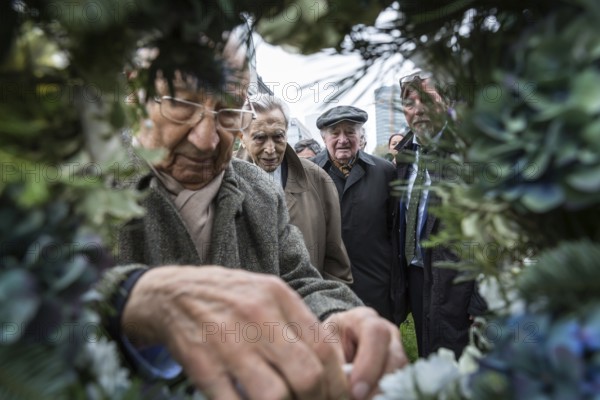 DEU Germany Germany Berlin Former Jewish concentration camp inmates join Polish schoolchildren in commemorating Kristallnacht with a wreath-laying ceremony at Wittenbergplatz
