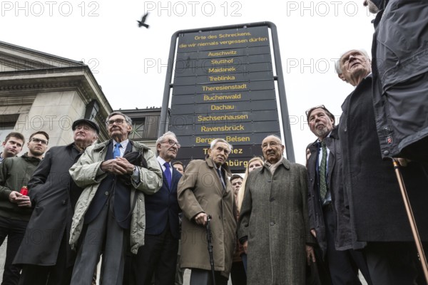 DEU Germany Germany Berlin Former Jewish concentration camp inmates join Polish schoolchildren in commemorating Kristallnacht with a wreath-laying ceremony at Wittenbergplatz