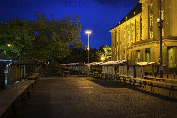 DEU Germany Germany Berlin The flea market stalls in front of Schöneberg Town Hall in the evening light