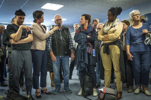 DEU Germany Germany Berlin Open day to present a new anchor centre on the grounds of the Karl Bonhoeffer mental hospital in Reinickendorf Visitors ask questions about the project