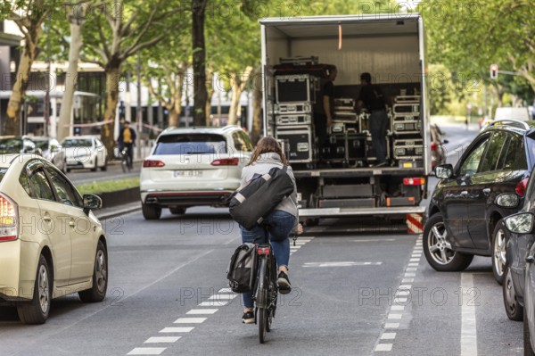 DEU Germany Germany Berlin A cyclist has to avoid a lorry parked in a cycle lane on Budapester Straße