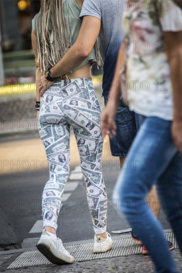 DEU Germany Germany Berlin Woman with dollar trousers in West Berlin corner Kurfürstendamm