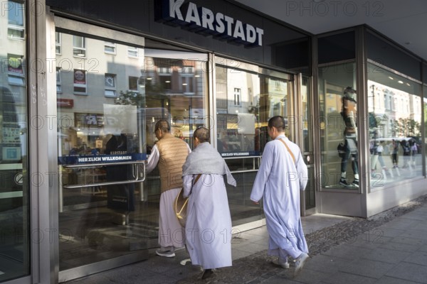 DEU Germany Germany Berlin Asians in the centre of Berlin-Spandau on their way to the Karstadt department stores'