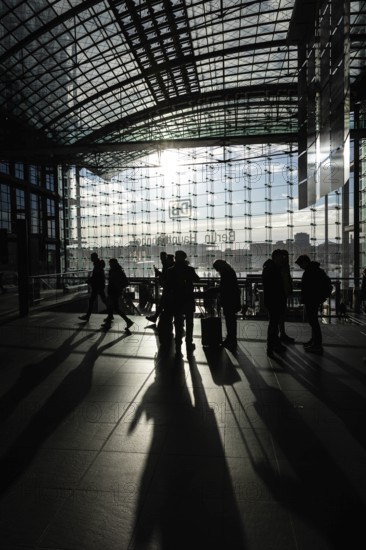 DEU Germany Germany Berlin Travellers cast their shadows in the main station at Washingtonplatz