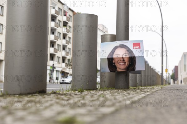 DEU Germany Germany Berlin A scrawled poster of the SPD's lead candidate for the European elections, Katarina Barley, hangs next to barriers in front of the BND building