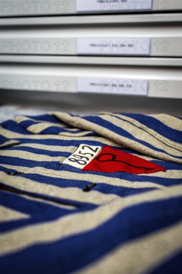 POL Poland Auschwitz Photo series about the memorial site of the former Auschwitz-Birkenau concentration camp. Storage of artefacts, here prisoners' clothing, in the conservation laboratory. POL Poland Auschwitz Scenes at the Holocaust Memorial Preserving laboratories with historical items like a prisoners suit . Each year more than 2 million visitors are touring through the remains of the former German Nazi concentration and extermination camp Auschwitz-Birkenau. More than 1, 1 million people have been killed here between 1940 and 1945