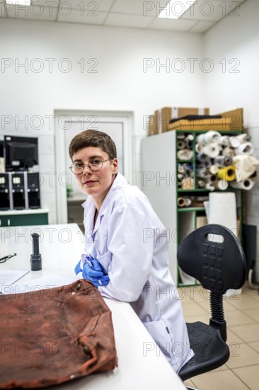 POL Poland Auschwitz Photo series about the memorial site of the former Auschwitz-Birkenau concentration camp. Processing artefacts in the conservation laboratory. Magrit Bormann works on a suitcase. POL Poland Auschwitz Scenes at the Holocaust Memorial .Preserving laboratories with historical items.Work on suitcases. Each year more than 2 million visitors are touring through the remains of the former German Nazi concentration and extermination camp Auschwitz-Birkenau. More than 1, 1 million people have been killed here between 1940 and 1945