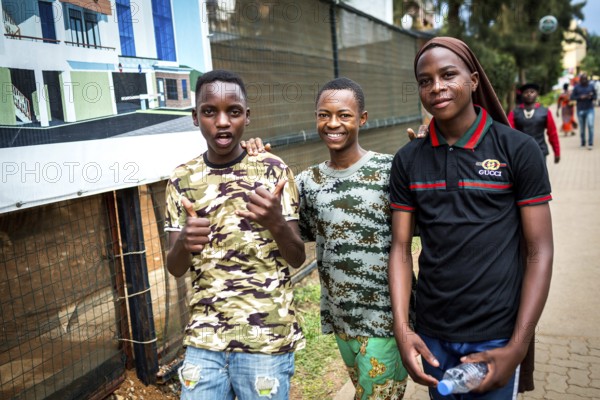 RWA RWANDA Rwanda Kigali Three young people on the street