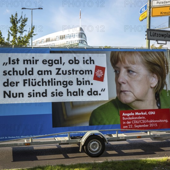 DEU Germany Germany Berlin Supporters with AFD poster against Merkel's refugee policy in front of the CDU's Konrad Adenauer House