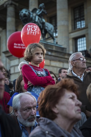DEU Germany Germany Berlin Final rally of SPD chancellor candidate Martin Schulz at Berlin's Gendarmenmarkt. Listening child in front of balloons