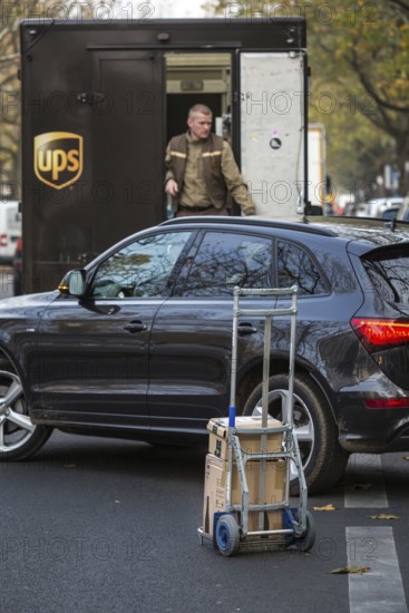 DEU Germany Germany Berlin A UPS parcel courier on Kurfürstendamm