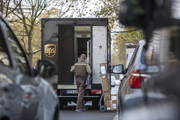 DEU Germany Germany Berlin A UPS parcel courier on Kurfürstendamm