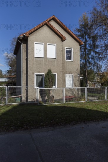 DEU Germany Germany Berlin A house with partially closed shutters in the Biesdorf district of Berlin