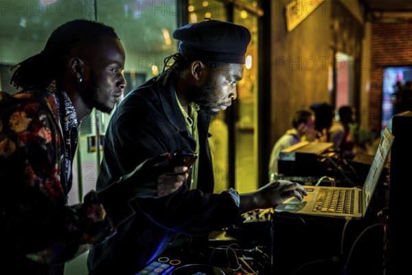 RWA RWANDA RUANDA Kigali A DJ plays in the Panorama Bar Ivy