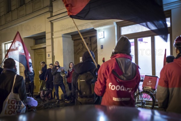 DEU Germany Germany Berlin Foodora bike couriers protest against poor working conditions and unequal pay in front of their distribution centre (hub) in Ackerstraße
