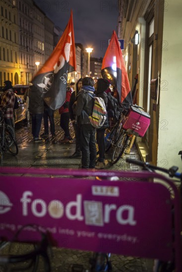 DEU Germany Germany Berlin Foodora bike couriers protest against poor working conditions and unequal pay in front of their distribution centre (hub) in Ackerstraße
