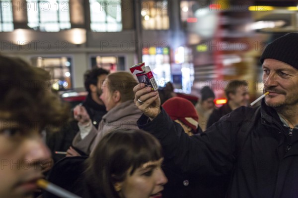 DEU Germany Germany Berlin Smoking for Deniz in front of the Taz