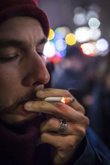 DEU Germany Germany Berlin Smoking for Deniz in front of the Taz