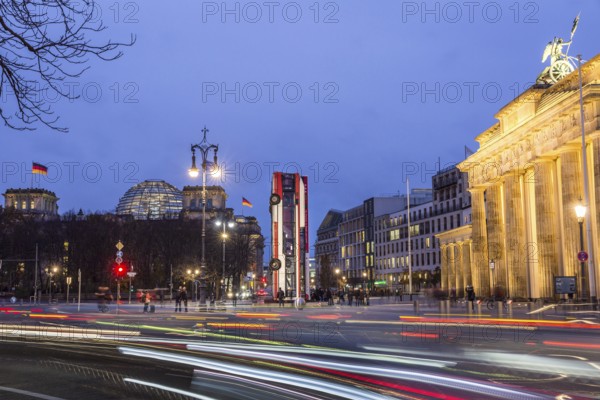 DEU Germany Germany Berlin The art installation by German-Syrian artist Manaf Halbouni is located in front of the Brandenburg Tor. The three vertically positioned buses, symbols of protection against snipers in Aleppo, are intended as a reminder of the civil war in Syria
