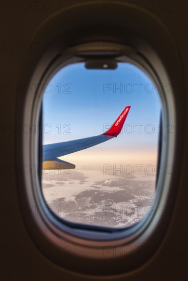 Egypt Hurghada aeroplane with Air Berlin lettering over snowy mountains