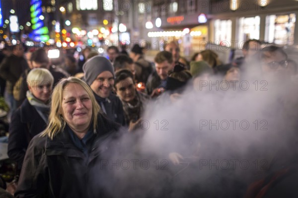 DEU Germany Germany Berlin Smoking for Deniz in front of the Taz