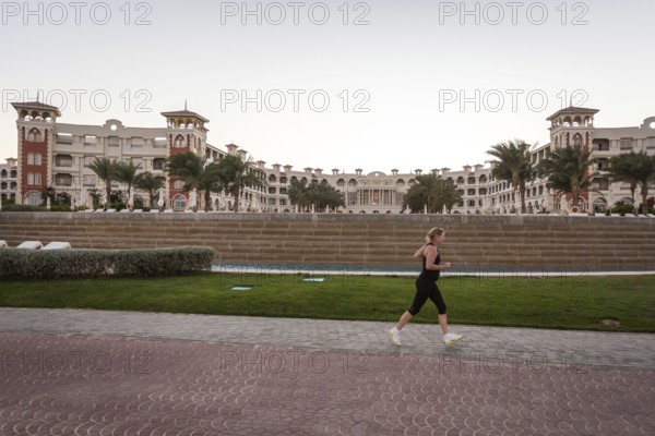 Egypt Hurghada A tourist jogging in front of a hotel