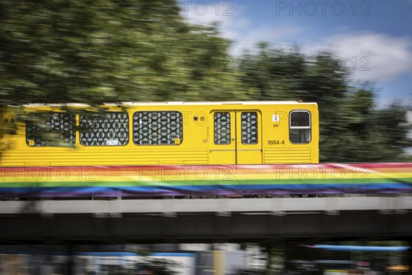 DEU Germany Germany Berlin An underground train arrives at Nollendorfplatz, which is decorated in rainbow colours in the run-up to Christopher Street Day