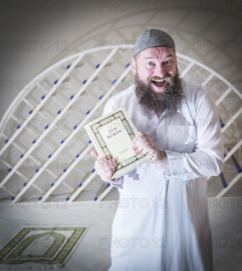 DEU Germany Germany Berlin The head of the Ibn Rushd Goethe Mosque, Christian Hermann, poses in the prayer room. The mosque is located on the premises of the Protestant St John's Church in Moabit