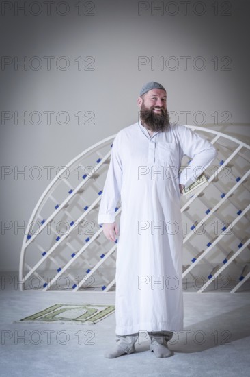 DEU Germany Germany Berlin The head of the Ibn Rushd Goethe Mosque, Christian Hermann, poses in the prayer room. The mosque is located on the premises of the Protestant St John's Church in Moabit