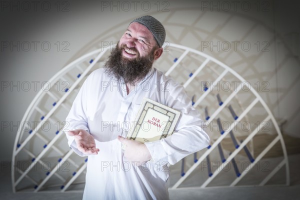 DEU Germany Germany Berlin The head of the Ibn Rushd Goethe Mosque, Christian Hermann, poses in the prayer room. The mosque is located on the premises of the Protestant St John's Church in Moabit