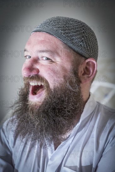 DEU Germany Germany Berlin The head of the Ibn Rushd Goethe Mosque, Christian Hermann, poses in the prayer room. The mosque is located on the premises of the Protestant St John's Church in Moabit