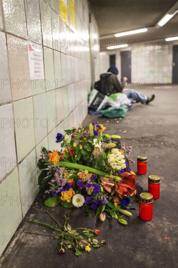 DEU Germany Germany Berlin Flowers and candles at Moritzplatz underground station, where a homeless man died from drugs a few days ago