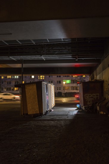 DEU Germany Germany Berlin Wooden shacks financed by donations stand under the motorway bridge in Pankow-Heinersdorf. The Cologne-based organisation 'Little Home' makes these houses available to homeless people throughout Germany