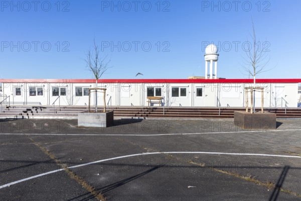 DEU Germany Germany Berlin A newly designed container village for refugees, the 'Tempohome', at the former Tempelhof airport in the city centre