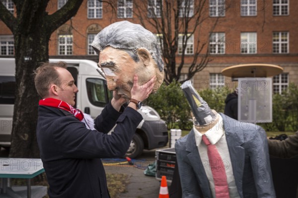 DEU Germany Germany Berlin Siemens employees and their suppliers demonstrate for wage increases and flexible working hours in front of the company's Berlin headquarters, the cardboard figure of Siemens CEO Joe Käser is dismantled after the warning strike