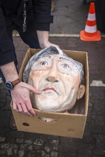 DEU Germany Germany Berlin Siemens employees and their suppliers demonstrate for wage increases and flexible working hours in front of the company's Berlin headquarters, the cardboard figure of Siemens CEO Joe Käser is dismantled after the warning strike