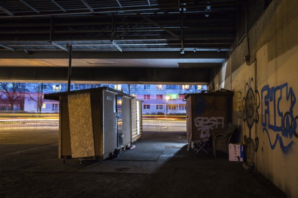 DEU Germany Germany Berlin Wooden shacks financed by donations stand under the motorway bridge in Pankow-Heinersdorf. The Cologne-based organisation 'Little Home' makes these houses available to homeless people throughout Germany