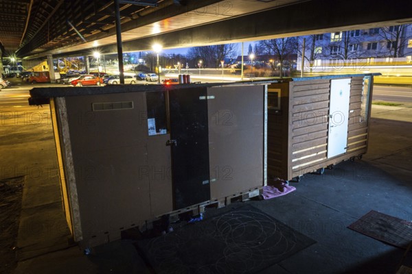 DEU Germany Germany Berlin Wooden shacks financed by donations stand under the motorway bridge in Pankow-Heinersdorf. The Cologne-based organisation 'Little Home' makes these houses available to homeless people throughout Germany