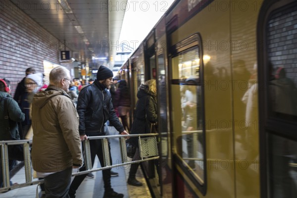 DEU Germany Germany Berlin Scenes in and around the S-Bahn.man travelling with ladder at Gesundbrunnen station