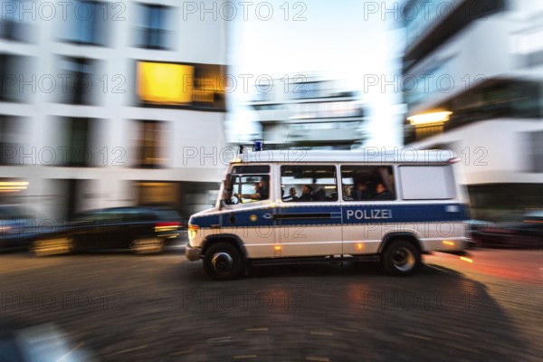 DEU Germany Germany Berlin Scene from Rigaer Straße, where squatters protest against the further gentrification of their neighbourhood. Riot police on duty during a party in a squatted house