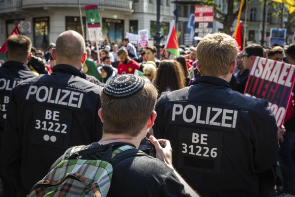 DEU Germany Germany Berlin Al Kuds march on Kudamm Press photographer with kippa