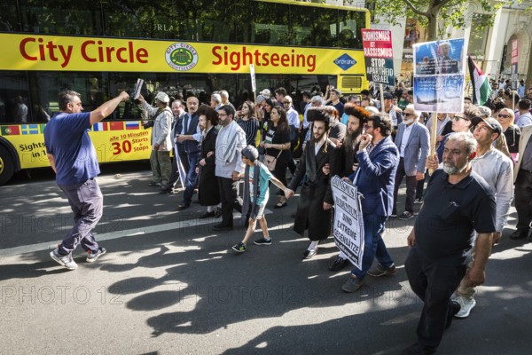 DEU Germany Germany Berlin Al Kuds march on Kudamm.demonstrators pass a sightseeing bus