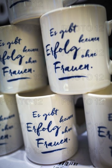 DEU Germany Germany Berlin Impressions from the Humboldt University Unter den Linden. Mug with woman's slogan in the Unishop