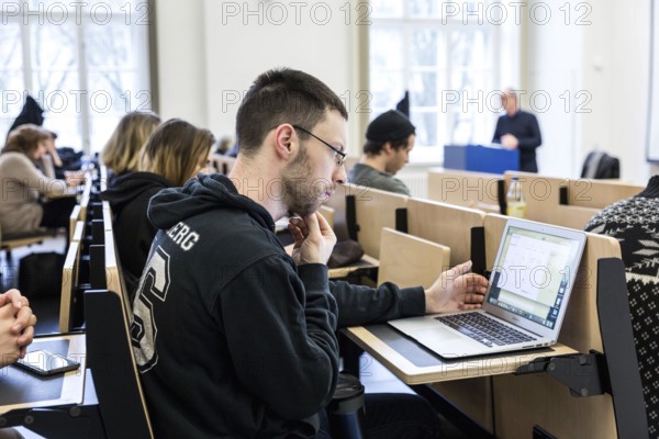 DEU Germany Germany Berlin Impressions from Humboldt University Unter den Linden. Students in the lecture theatre during a lecture by Professor Jörg Baberowski