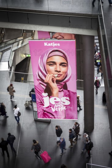 DEU Germany Germany Berlin An advertising banner with a Muslim woman promoting Katjes vegetarian products at Berlin Central Station