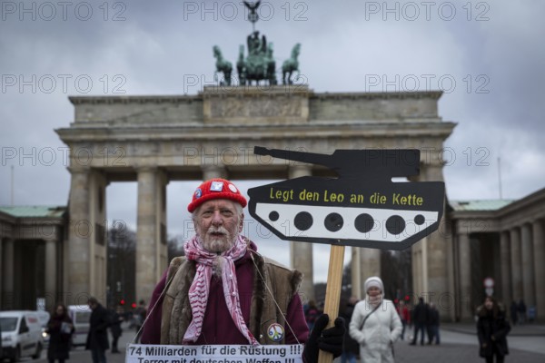 DEU Germany Germany Berlin A demonstrator protesting against arms deliveries to Turkey in front of the Brandeburger Tor on the initiative of Campact