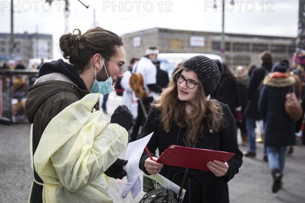DEU Germany Germany Berlin Members of the 'Referendum for Healthy Hospitals' initiative collect signatures at Warschauer Brücke in Friedrichshain to realise a referendum