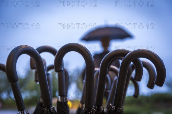 ITA Italy Castelfalfi Umbrellas in front of a hotel