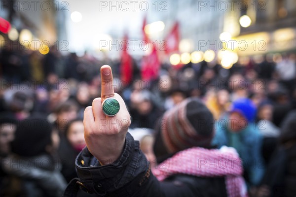 DEU Germany Germany Berlin Demonstration ' March of Women, which was organised by AFD member, the Kurdish woman Leyla Bilge. The protest was directed against the sexism of asylum seekers and the German government's immigration policy. Counter-demonstrators form a sit-in blockade at Checkpoint Charlie