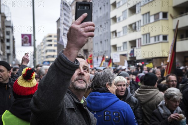 DEU Germany Germany Berlin Demonstration ' March of Women, which was organised by AFD member, the Kurdish woman Leyla Bilge. The protest was directed against the sexism of asylum seekers and the German government's immigration policy, with Lutz Bachmann reporting from the demonstration on his mobile phone